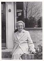 Doris Carley in front of her office