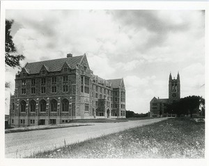 Saint Mary's Hall and Gasson Hall from flowery edge of Linden Lane, by Clifton Church