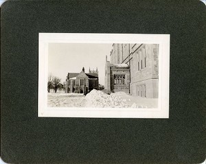 Bapst Library exterior: main entrance in winter, with Gasson Hall in foreground, by Clifton Church