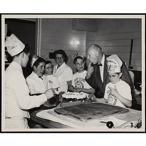 "Executive Director of Boys' Club of Boston Arthur T. Burger and members of the Tom Pappas Chefs' Club visit the Brandeis University kitchen and dining halls"