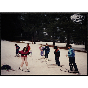 A group of children practice skiing during a trip to Nashoba Valley