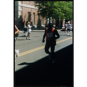 A man runs during the Battle of Bunker Hill Road Race