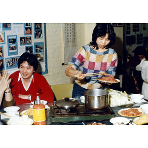 Guests eating at a Chinese Progressive Association party