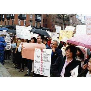 Demonstrators from several ethnic groups, including people from the Chinese Progressive Association, participate in a rally outside the Massachusetts State House for bilingual education in schools