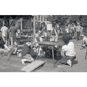 Shoppers at an outdoor sale event