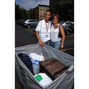 Odalis David Polanco poses with a woman during move-in