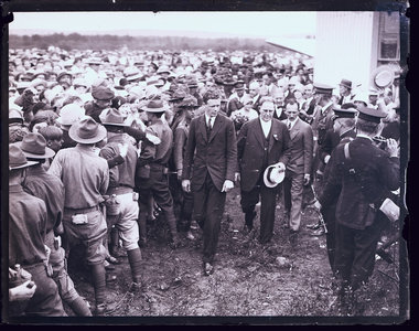 Charles Lindbergh walking with Mayor Fred Marden in Concord, N.H., 25 July 1927
