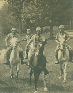 Campers riding horseback, undated