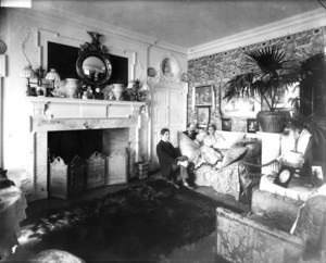 Group portrait of Arthur Little, Anna Palfrey and unidentified man, sitting in the morning room, Arthur Little House, 2 Raleigh St., Boston, Mass., undated