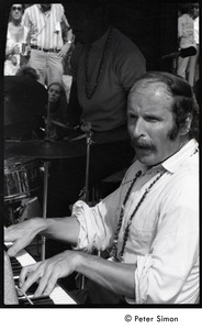 Joe Zawinul on keyboards with the Cannonball Adderley Sextet, performing at Jackie Robinson's jazz concert