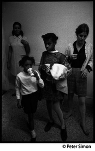 Girls and teachers in a hallway, Liberation School, Boston, Mass.