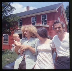 Five months old: Eben Light (five months old), with father Charles Light, mother Nina Keller, and grandfather Roy Finestone, in front of house at Montague Farm Commune