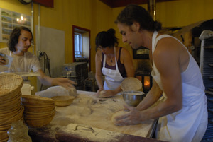 Hungry Ghost Bread: Jonathan C. Stevens and bakers preparing bread dough