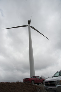 Wind turbine with trucks parked at the base, Berkshire Wind Power Project