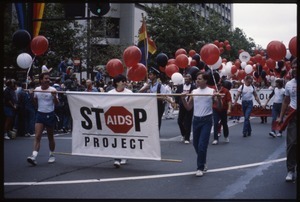 Marchers in the San Francisco Pride Parade with banner for Stop AIDS Project