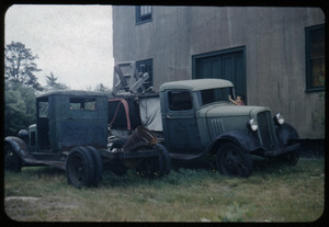 Old bog trucks behind the screen house, Duxbury Cranberry Company