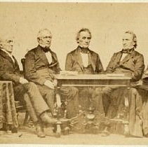5 men sitting