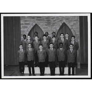 Choral group of the Boys' Clubs of Boston posing on the stage