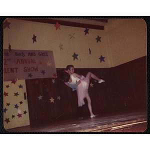 A girl and a boy dancing together at the Boys and Girls Club's 2nd Annual Talent Show