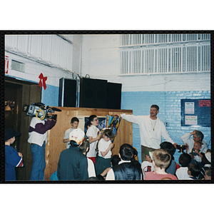 Children attend a gun awareness event with community activist and author Michael Patrick MacDonald (background, center)