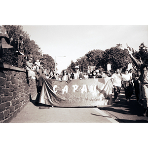 Coalition for Asian Pacific American Youth members march at the Latino and Immigrants' Rights March