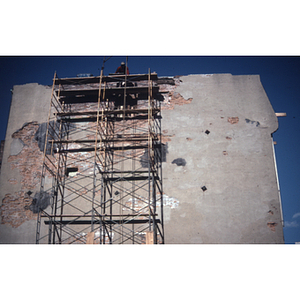 View of a scaffolding on the exterior of a building in Boston's Chinatown