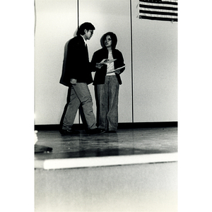 Man and woman perform a theatrical sketch onstage at the Josiah Quincy School about the normalization of U.S. and China relations