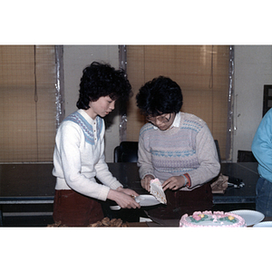 Guests and cake at an International Women's Day event