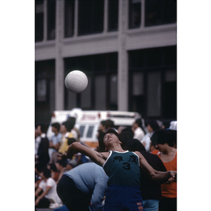 Volleyball player jumping for the ball