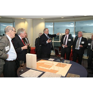 Neal Finnegan gestures while speaking at the Veterans Memorial dinner