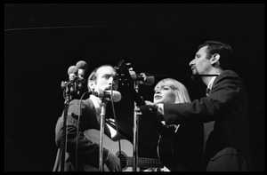 Peter, Paul, and Mary performing on stage, Newport Folk Festival