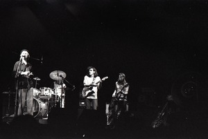 Hot Tuna concert: Band in performance on stage: Will Scarlett at microphone, Jorma Kaukonen (guitar) and Jack Casady (bass) behind