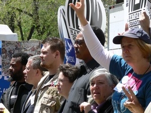 Jesse Jackson among the protesters during the march opposing the War in Iraq (Cindy Sheehan at far right)
