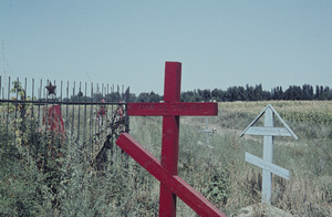 Christian gravesites next to communist graveyard