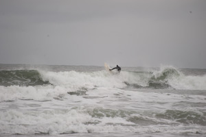 Surfer riding a wave