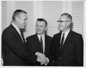 John W. Lederle joining hands with John T. Fallon and John N. Philips.
