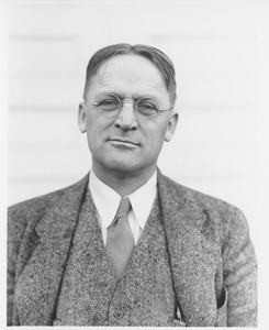 Harold M. Gore standing outdoors