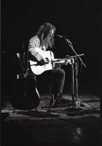 Neil Young performing at the Music Hall