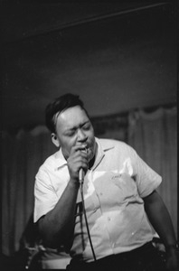 James Cotton at Club 47: James Cotton singing into a microphone onstage