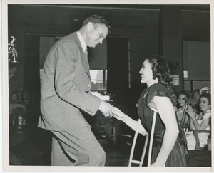 Dr. Knocke handing prize to Carmela Primiani at Institute Day