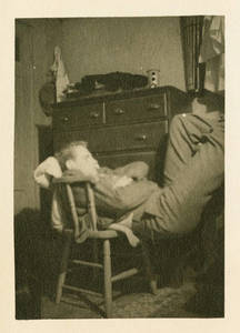 Leon M. Smith sleeping in chair