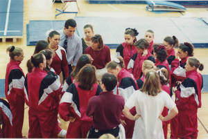 Springfield College women's gymnastics team huddle