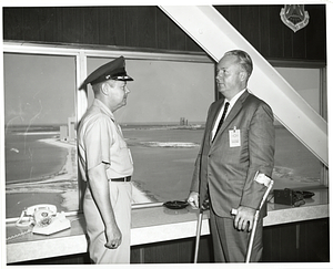 Mayor John F. Collins with unidentified military officer at Air Force Easern Test Range, Cape Kennedy (now Cape Canaveral)