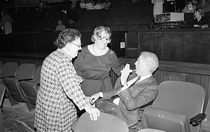 Mayor Kevin H. White with two women at the Strand Theatre