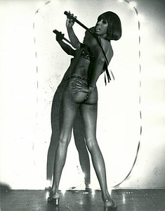 A Photograph of Marlow Monique Dickson Posing in a Sparkly Bikini