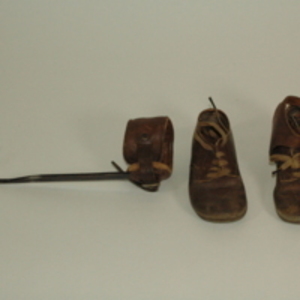 Child's shoes and calf brace, 1944-1945