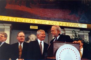 John Joseph Moakley (behind podium) and William Bulger (third from left) at Moakley's Silver Jubilee event