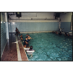 Children swim in a natorium pool