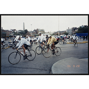 Riders leave a parking lot during the Charlestown Bike Race