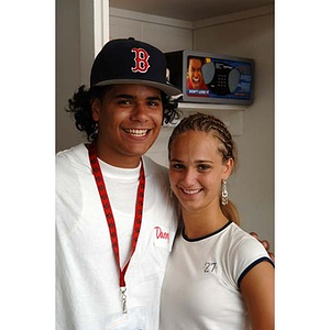 Danny Vazquez and a young woman during Torch Scholars move-in